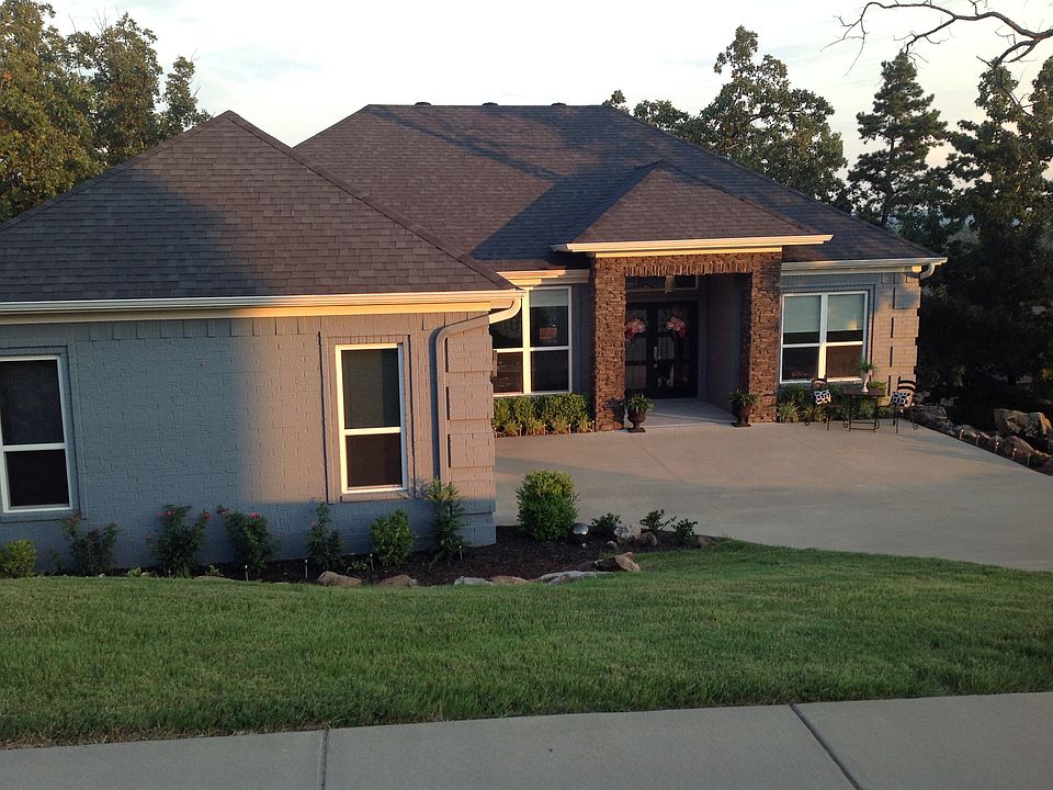 Perched on sloped lot