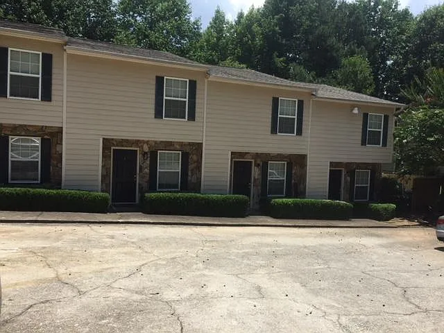 3857 Moran Way, Peachtree Corners. Unit D is a highly desirable end-unit on the far right of the picture and includes two off-street parking spaces directly in front of the unit.