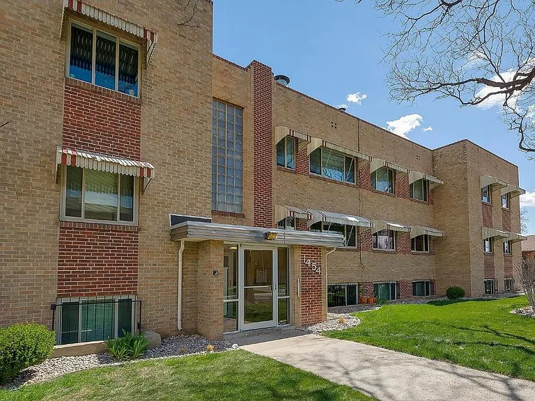 Secure building with locked main entrance, mailboxes and secured package delivery.