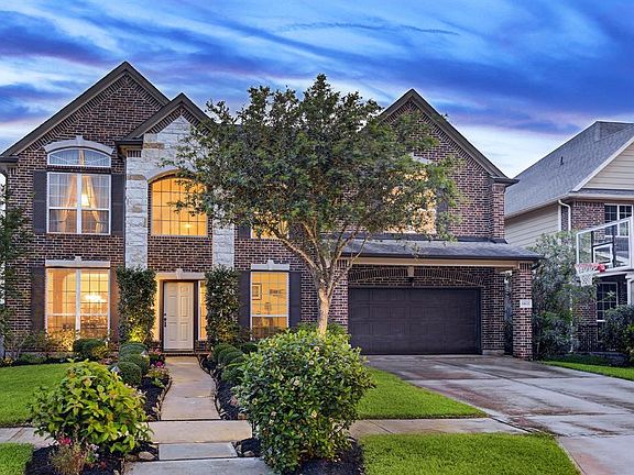 Beautiful curb appeal. Landscape lighting are high quality solid brass.