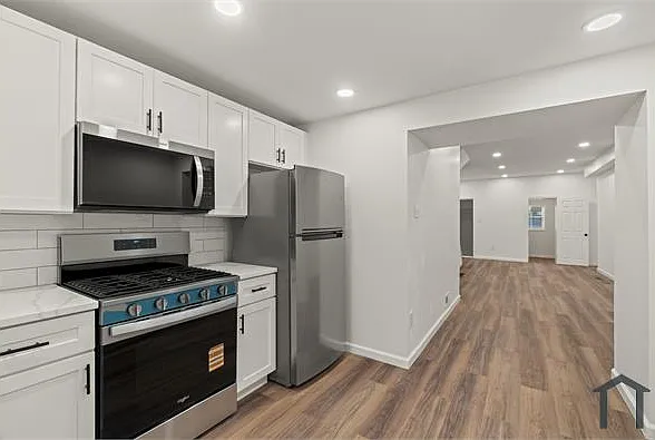 5411 Delancey St — Photo 1