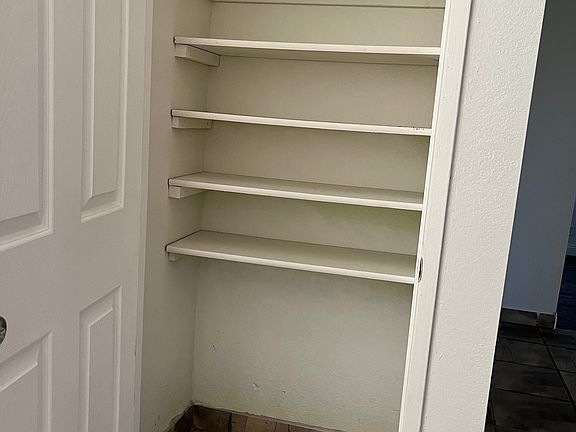 Linen closet by front door
