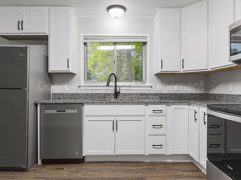 1945 Barrett Dr — Photo 2