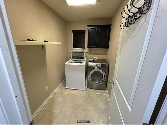 Laundry Room with washer and dryer
