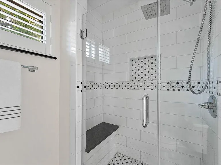Large walk in shower in master bathroom.