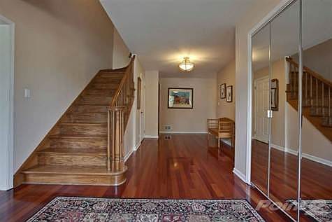 This gracious large center foyer greets you as you\nenter -- leads to sunken Living Rm (left), Dining Rm\n(right, beyond large guest closet) & back to hallway\nw/access to Family Room, 5th Bedroom (now used as\nan office), updated powder room & kitchen.