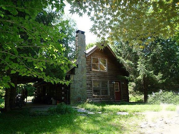 Log Home on a Stream