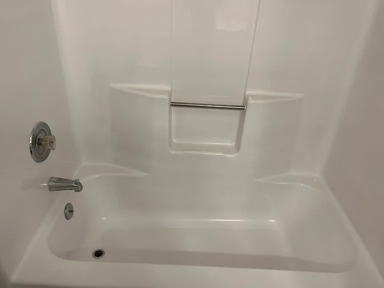 Refinished bathtub in both bathrooms.