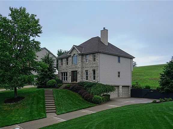 The beautifully updated 4 bedroom brick front provincial set on a half acre lot is sure to catch your eye from the curb.