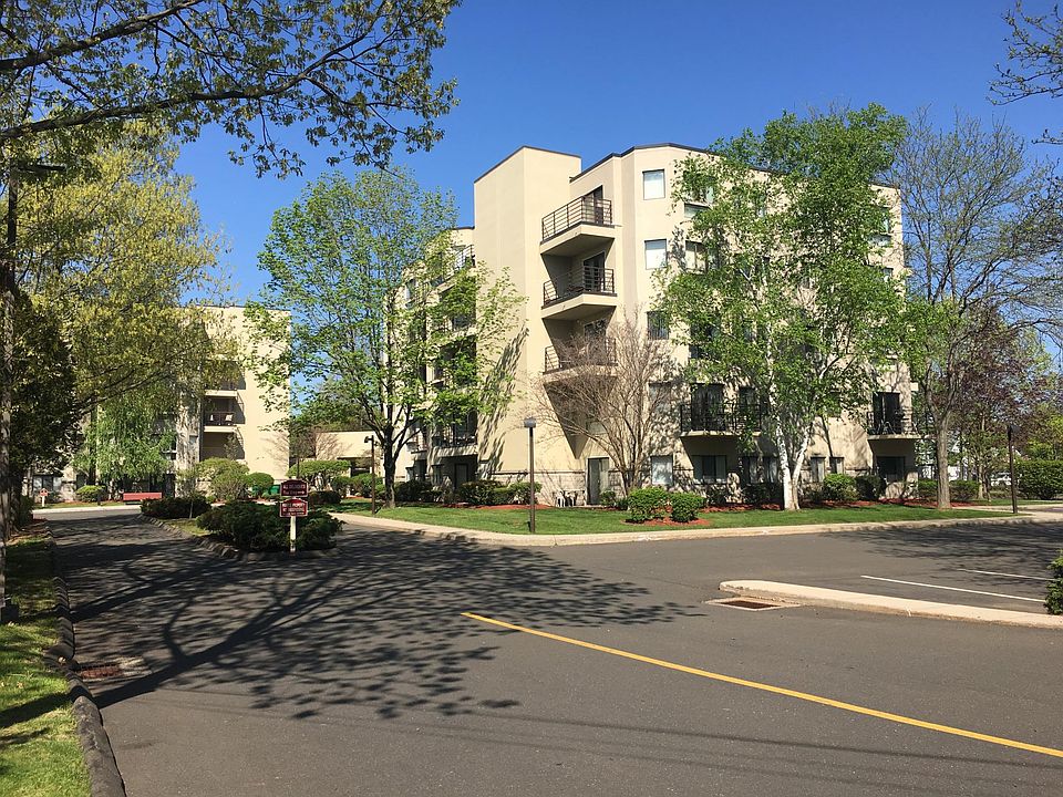 Entry from Whitney Avenue, one floor lobby joins 2 five level buildings