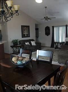 Dining room and family room : Both rooms have vaulted ceilings and sky lights. It is very open and b