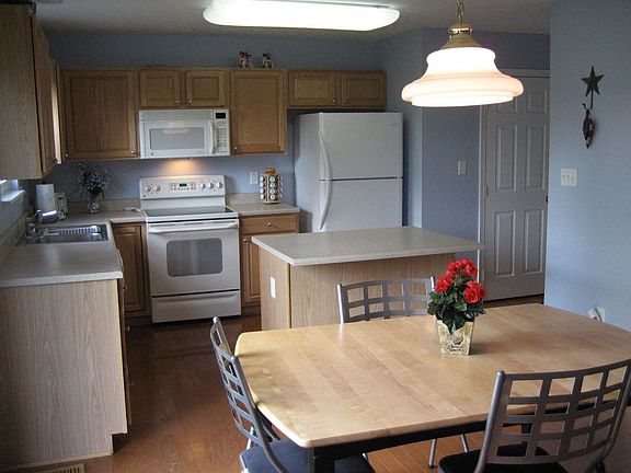 Beautiful kitchen with island and laundry off kitchen