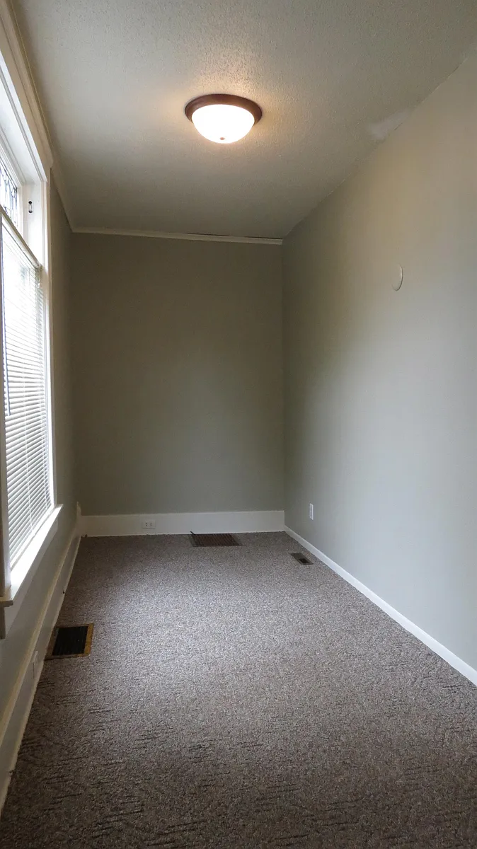 Bedroom 1 - flooring is now hardwood - 402 Lincoln Ave