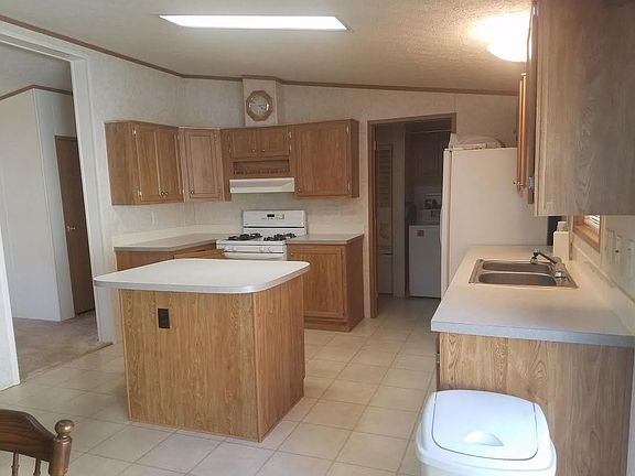 Kitchen facing laundry 
