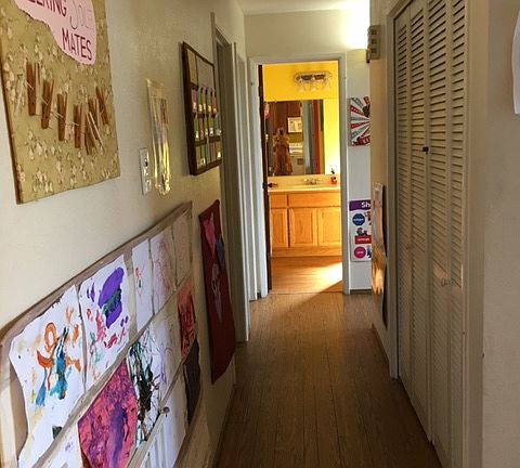 Hallway with laundry.