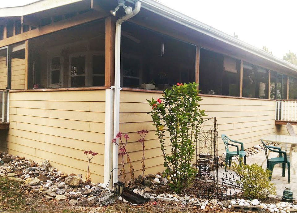 Enclosed porch on 2 sides 