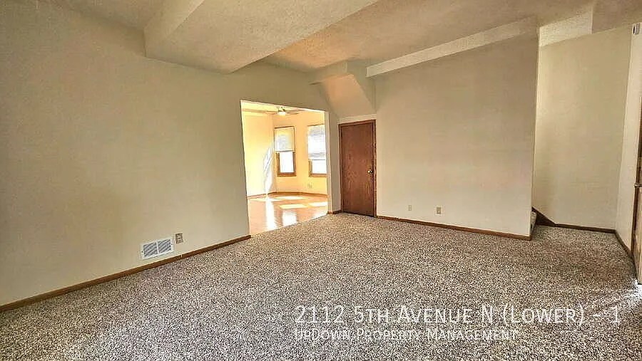 "Charming 3-Bed Unit in the Vibrant Harrison Neighborhood 1200 Sq. Ft. of Modern Comfort!" — Photo 3