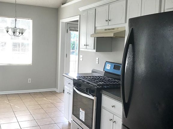 Large kitchen with an attached pantry