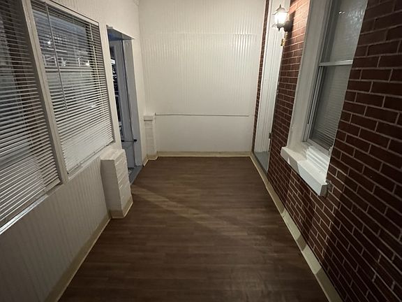 Enclosed porch with new flooring
