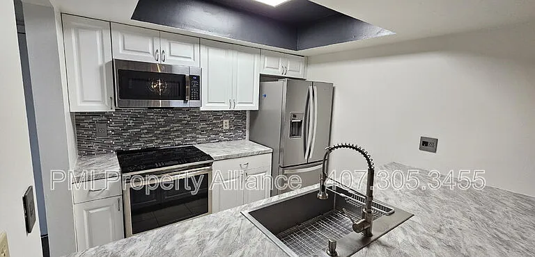 6051 Windhover Dr — Photo 1