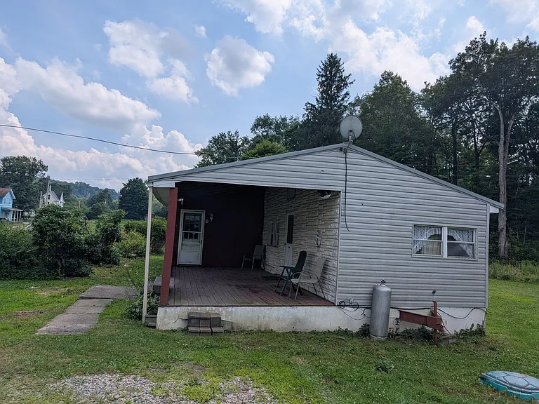 Off street parking for 2 vehicles, large covered front porch.