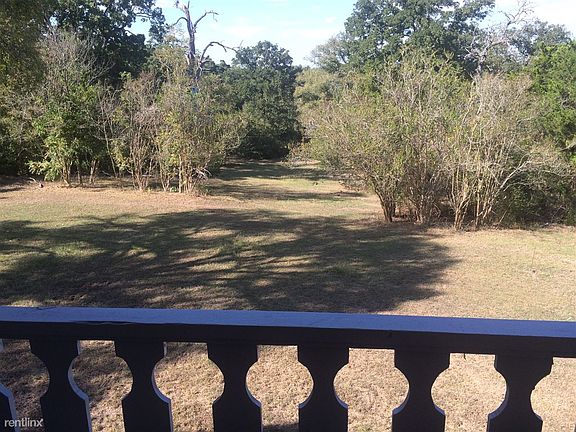 View of yard from Balcony. Unit B