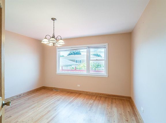 5th image of 6945 W Leland Ave