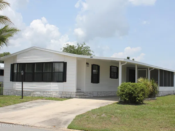 449 Dolphin Cir, Barefoot Bay, FL 32976