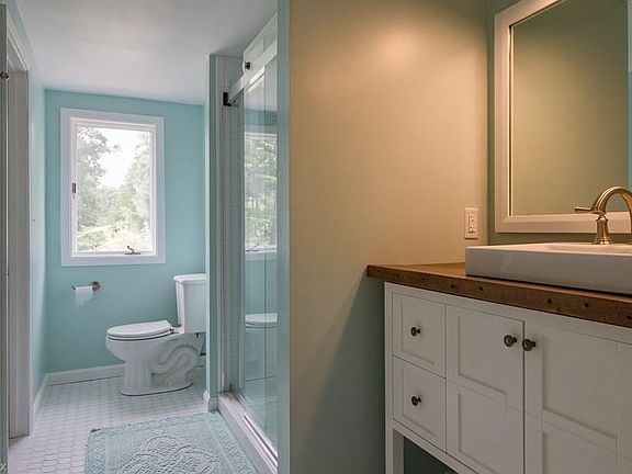 The 2nd Floor Master Bathroom was renovated in early 2018, which includes ceramic floors, tile shower with glass doors, furniture style vanity with square vessel sink, and access to the 2nd Floor Additional Living Space.