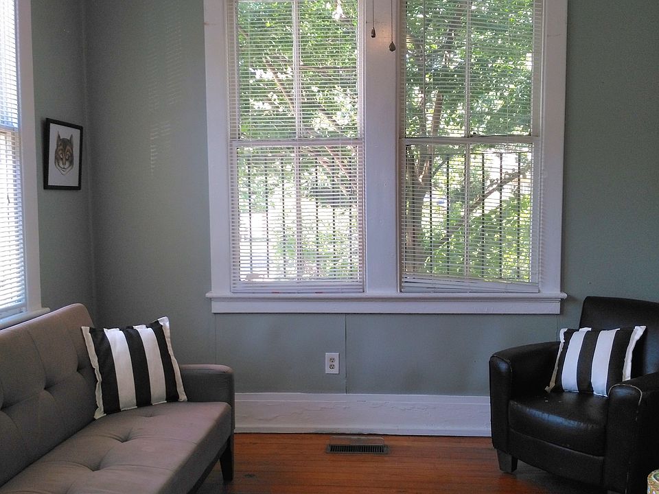 Light & airy corner room. Versatile floorplan of apartment allows this room to serve as the living room or as a bedroom.
