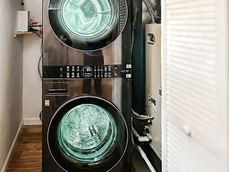In-unit LG stacked washer and dryer for convenient private laundry.