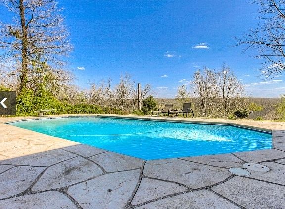 Relax by the pool with a great view
						:
						Heated custom gunite pool overlooks Clear Creek Valley. Peaceful and private.