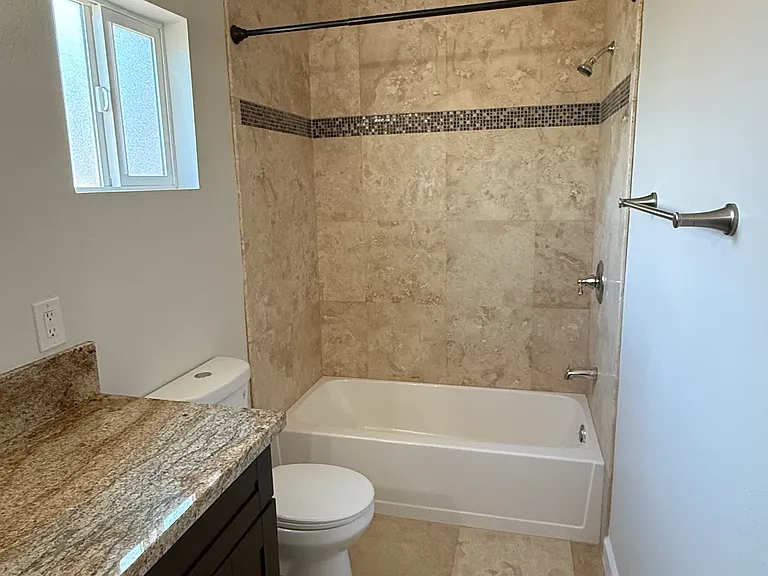 Bathroom upstairs with bathtub