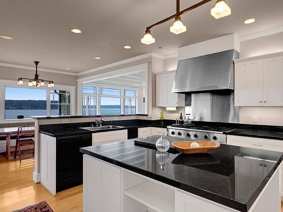 A true cooks kitchen! Granite counters, 6 burner stove, plenty of counter, storage including a full size pantry! Perfect for those large gatherings!