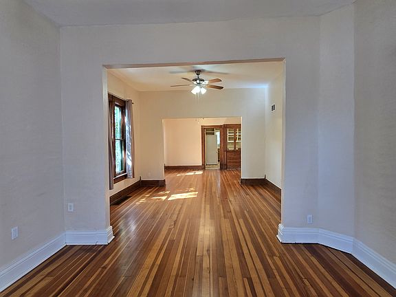 Living room through to dining room and kitchen