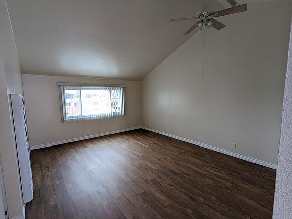 :living room with vaulted ceiling