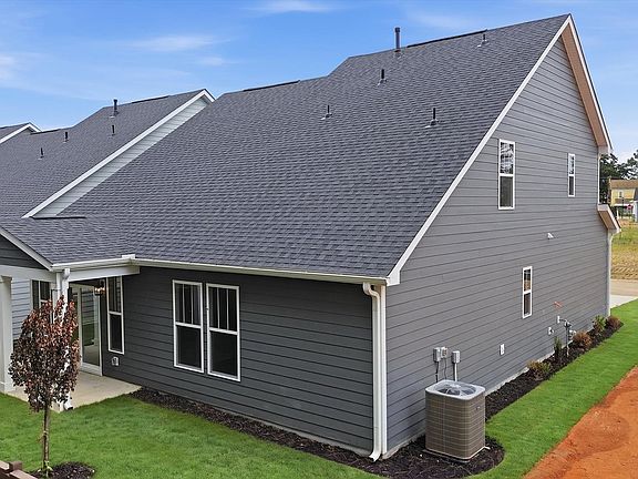 Exclusive rear covered porch with accomplished detail and elevated outdoor living potential by DRB H