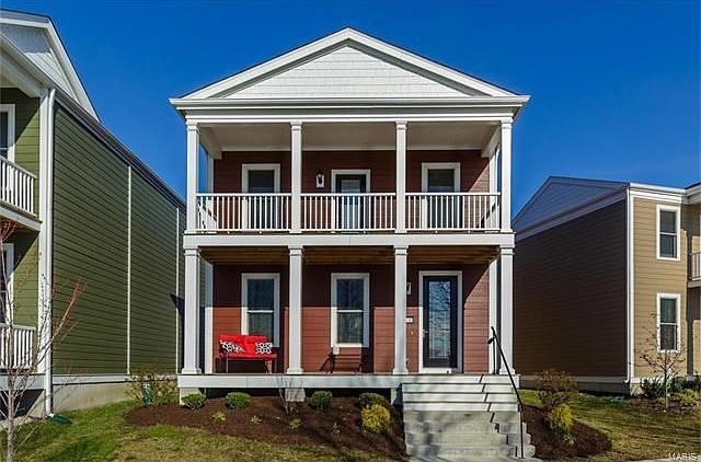 Welcome to 5016 Arpent Street in New Town with a beautiful water view!