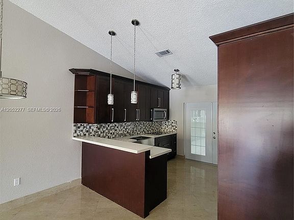 5th image of 7191 W 24th Ave #Penthouse 50-5