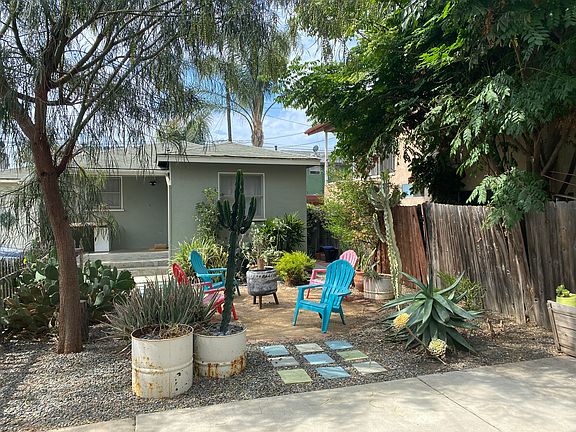 Drought tolerant back yard garden with fire pit and patio!