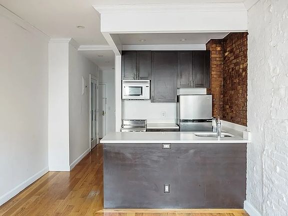 2nd image of 249 E 10th St APT 4