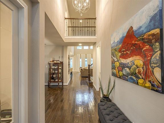 Entry at front door with 19' ceiling.