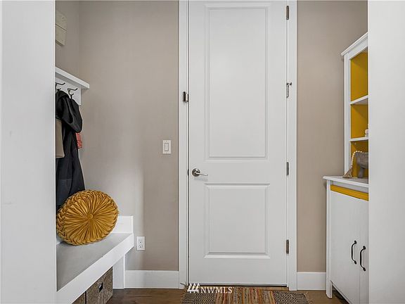 Mudroom and door to the attached 2 car garage
