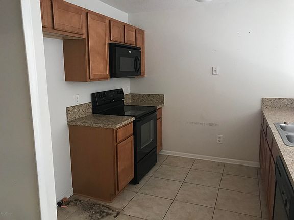 3rd image of 6965 Ortega Woods Dr Unit 6-11