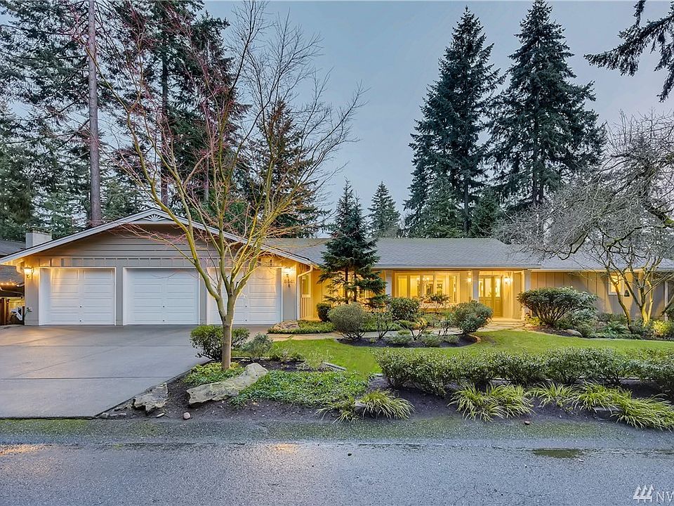 Level entry on a quiet street with underground utilities.