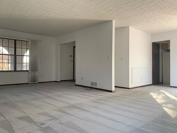 Living and dining area - great natural light!
