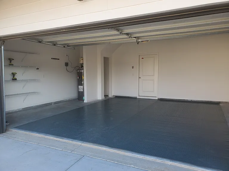2 car garage with garage floor pad for easy maintenance