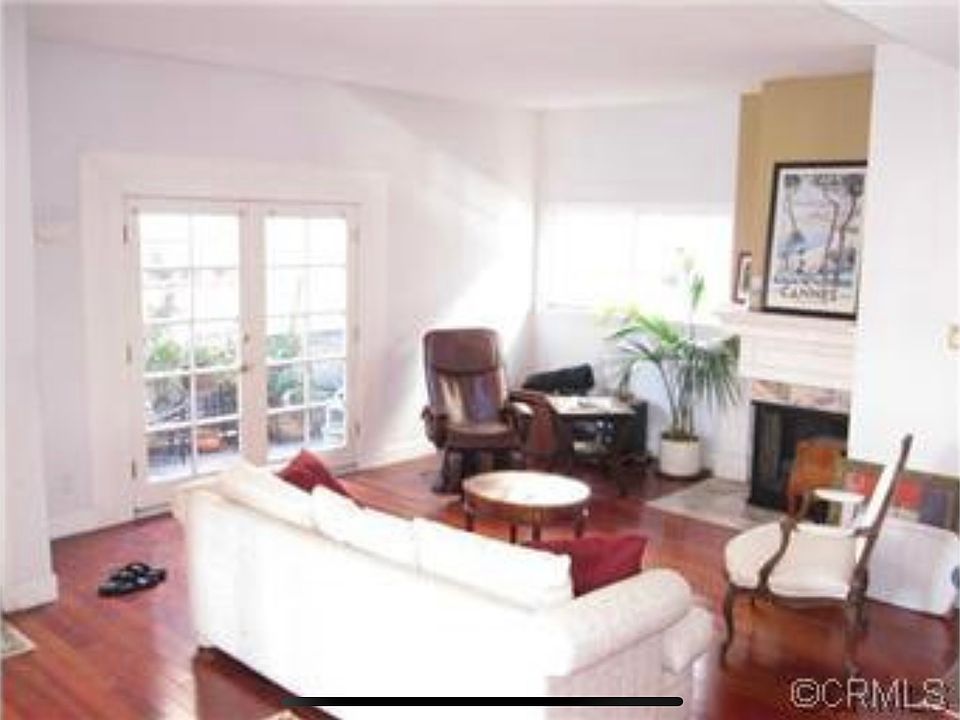 Living room with French doors leading to outdoor patio