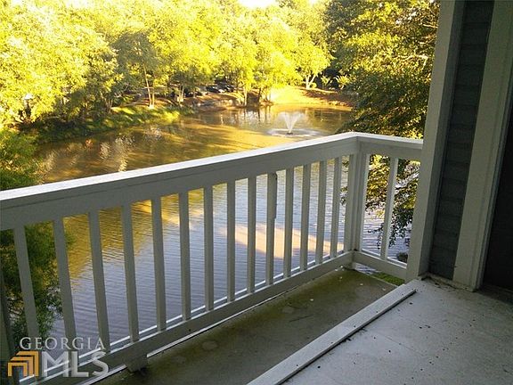 From the great room, sliding glass doors overlooking peaceful view.