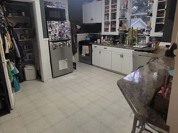 view from the living room entrance back into the kitchen